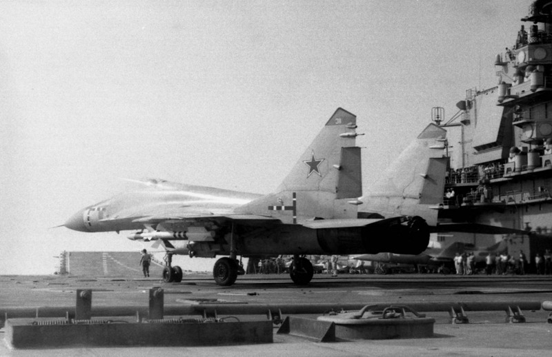 Illustration for article titled Taking Off In A MiG-29K From A Carrier At Night Is A Fiery Thrill